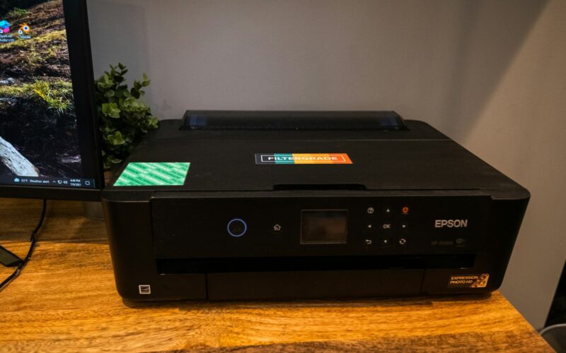 Inkjet printer set up on a home office desk