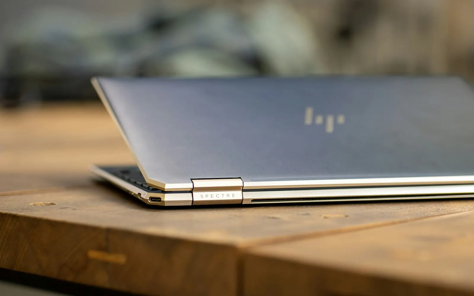 HP laptop on a wooden desk — serviced by Mount Vernon Computers