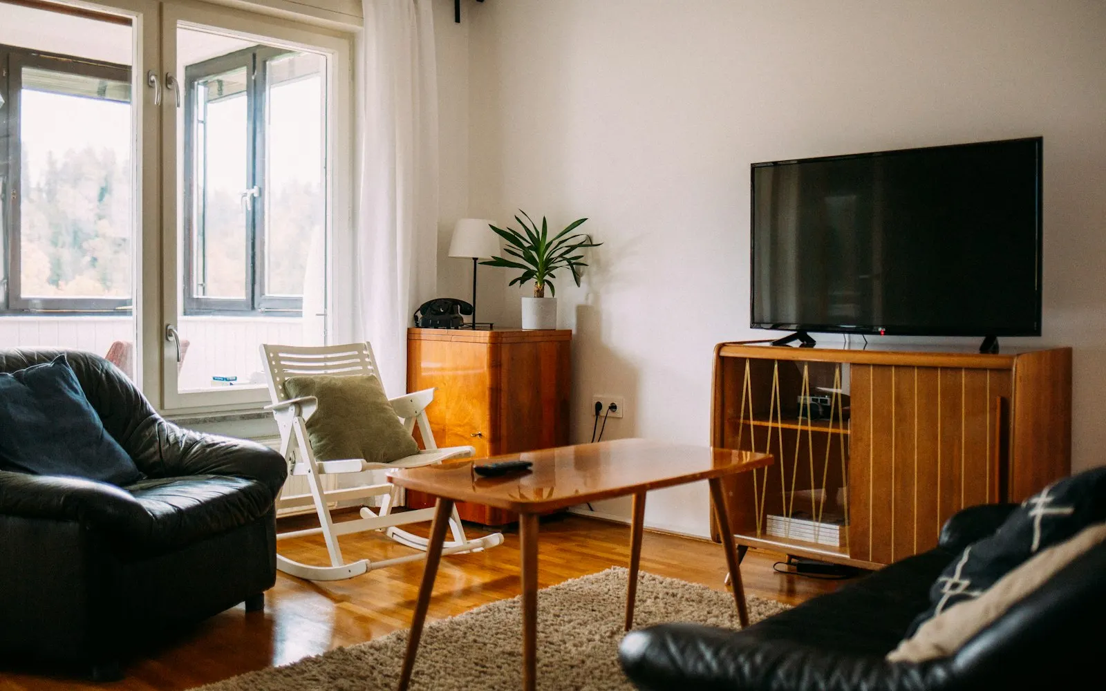 Living room with a wall-mounted smart TV