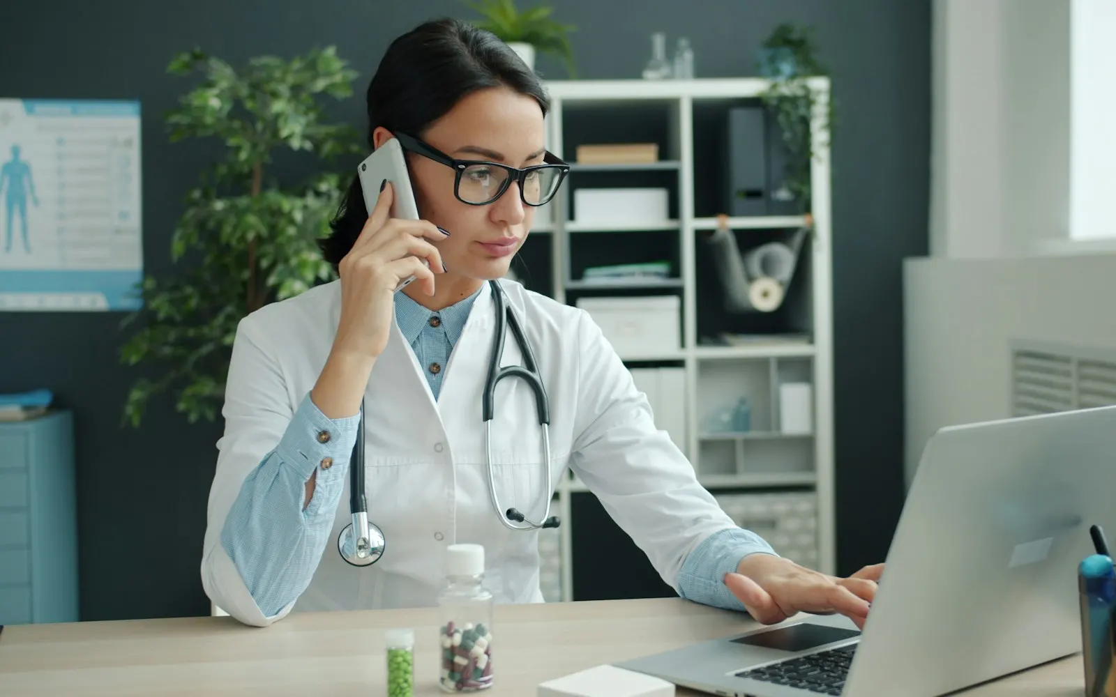 Doctor working at a computer in a medical office