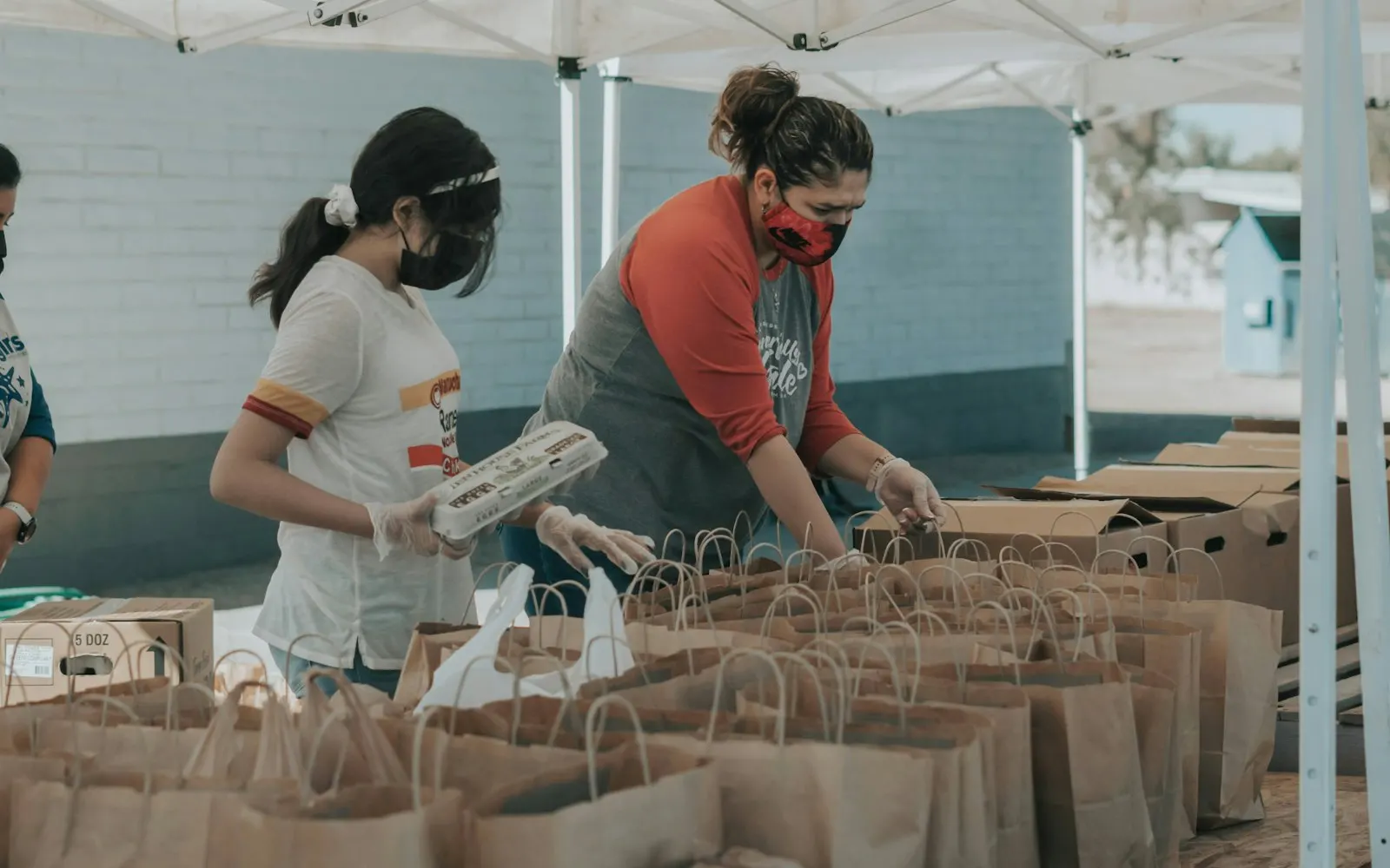 Nonprofit volunteers packing donations