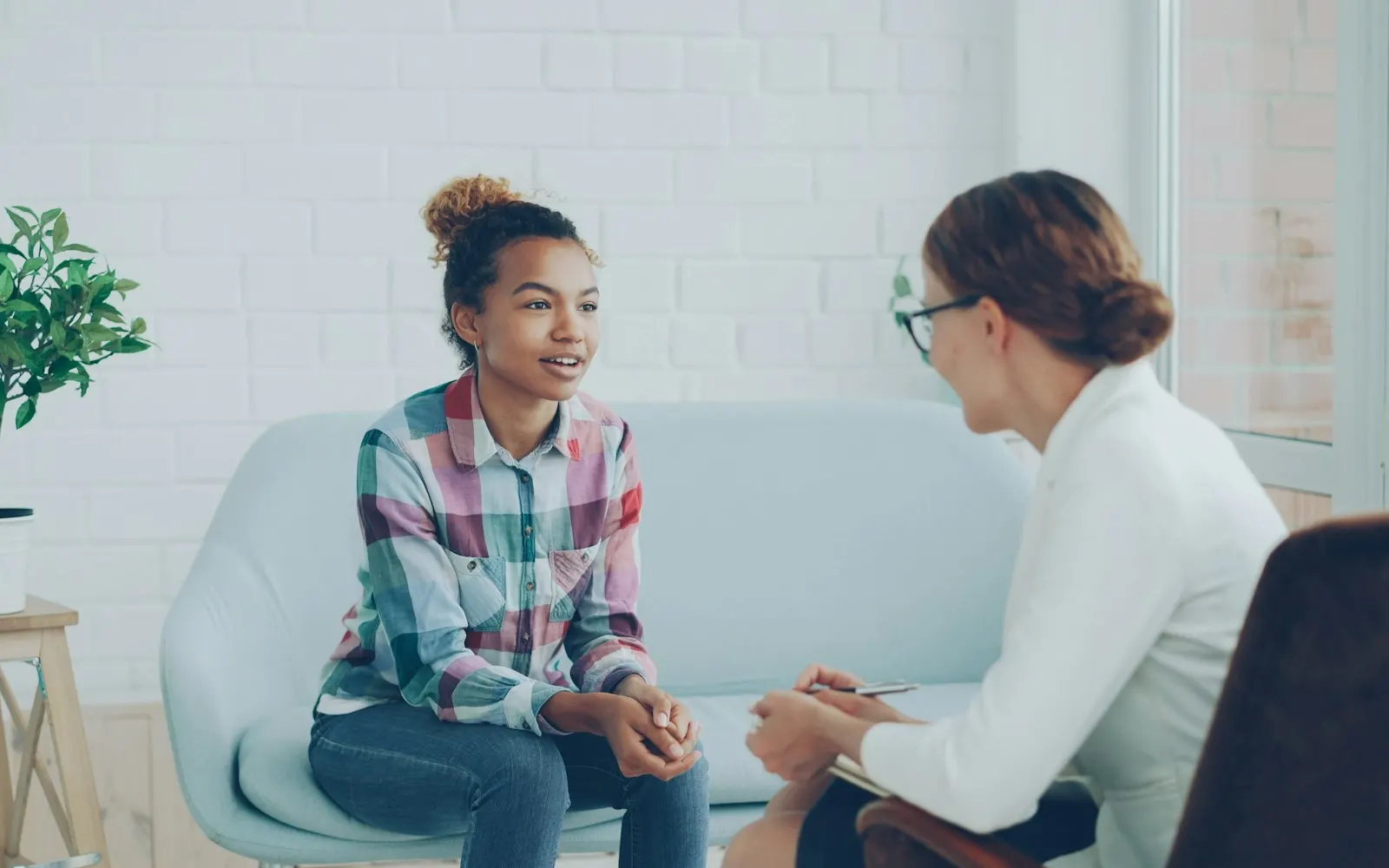 Therapist in session with a client